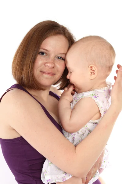 Mateřství. milující matka drží dítě v náručí. série — Stock fotografie