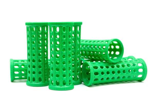 Grønne curlere isoleret på en hvid baggrund - Stock-foto