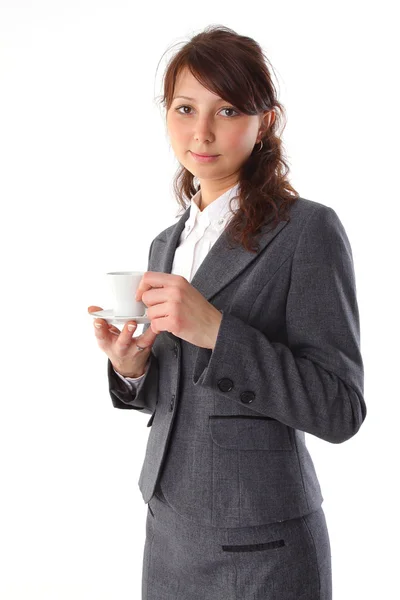 Cheerful business woman holding coffee cup. Isolated against whi — Stock Photo, Image