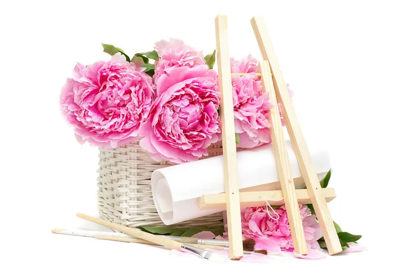 Summer morning artist. Concept. Easel, paper, brushes and flower — Stock Photo, Image