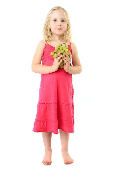 Klein meisje neemt bos van druivenmost. geïsoleerd over Wit — Stockfoto