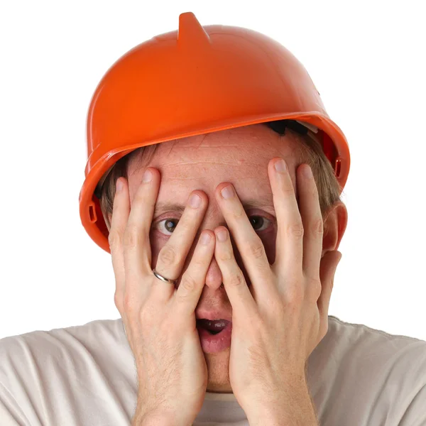 Shocked and surprised builder craftsman isolated on a white back — Stock Photo, Image