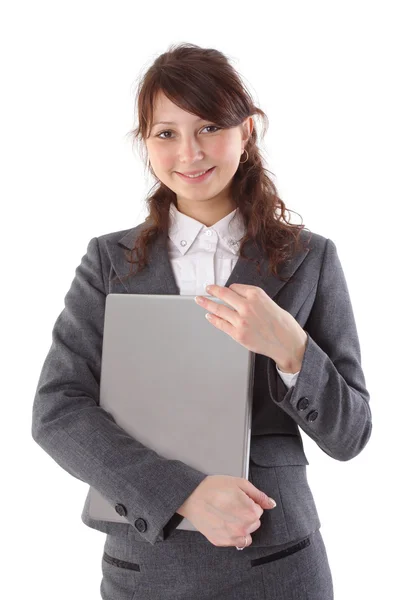 Mutlu kadın öğrenci üzerinde beyaz izole bir laptop holding — Stok fotoğraf