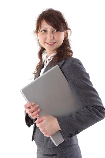 年轻笑女商人持有一台笔记本电脑 — 图库照片