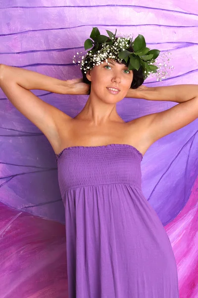 Beautiful sensual woman in summer dress and wreath of flowers an — Stock Photo, Image
