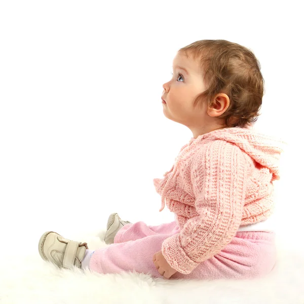Criança pequena olha para cima. Isolado sobre fundo branco — Fotografia de Stock