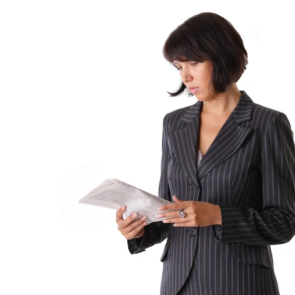 Business woman reading a newspaper — Stock Photo, Image
