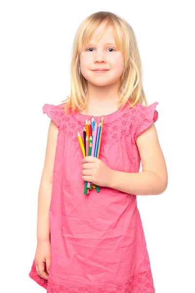 Улыбающаяся маленькая девочка с карандашом — стоковое фото