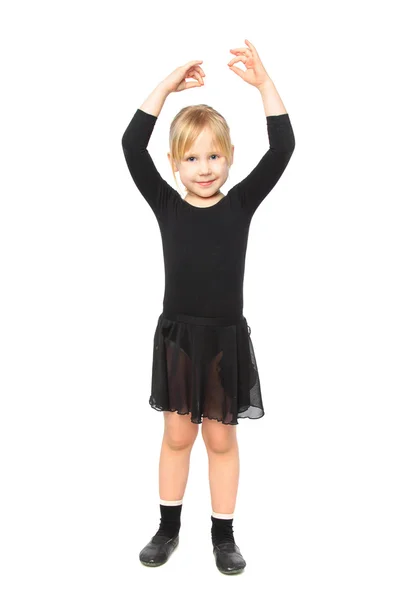 Lasten kunto. Iloinen tyttö tekee aerobic — kuvapankkivalokuva