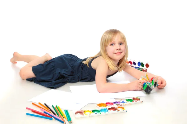 Cheerful child with paint end pensil — Stock Photo, Image