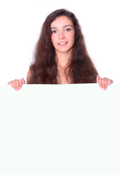 Mulher bonita segurando placa branca vazia — Fotografia de Stock