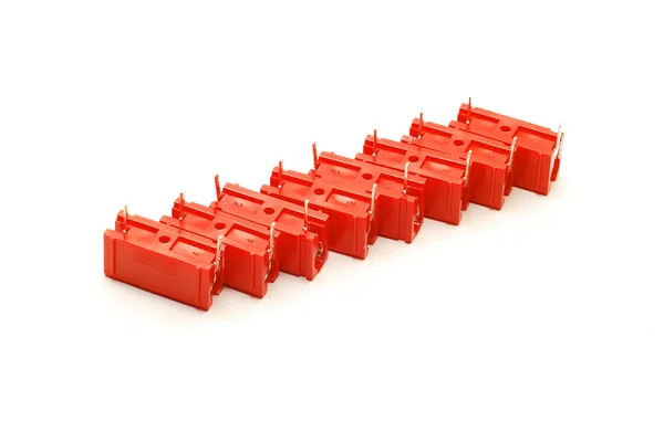 Красные конденсаторы — стоковое фото