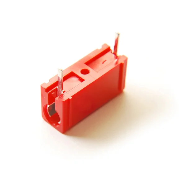 Red capacitor isolated — Stock Photo, Image
