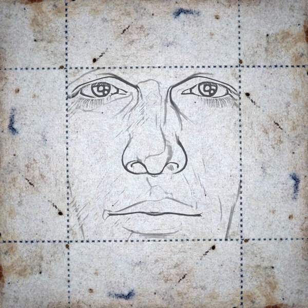 Face on stained paper