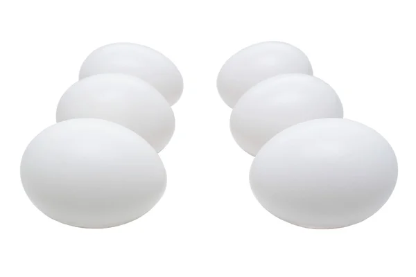 Seis ovos brancos isolados em branco — Fotografia de Stock