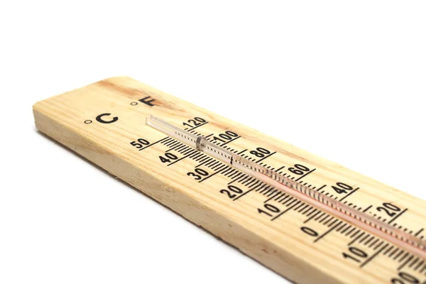 Деревянный термометр на белом фоне — стоковое фото