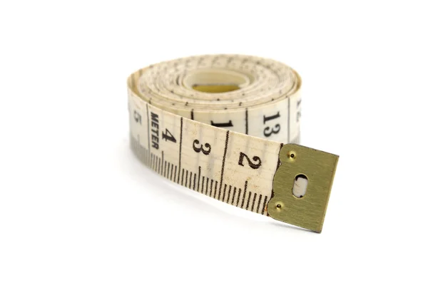 Rolled measuring tape isolated on white — Stock Photo, Image