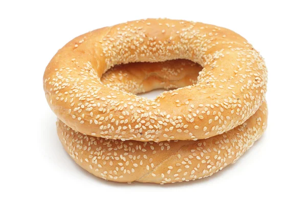 Two bagels with sesame seeds isolated on white — Stock Photo, Image