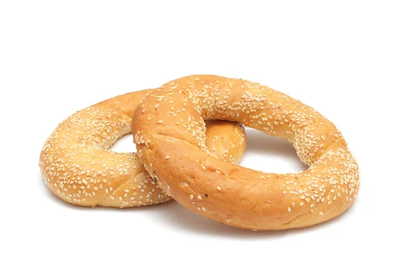 stock image Two bagels with sesame seeds isolated on white