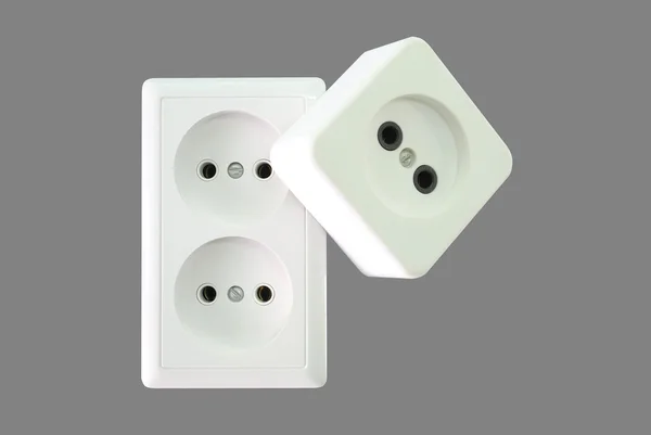Electrical sockets on a grey background. — Stock Photo, Image