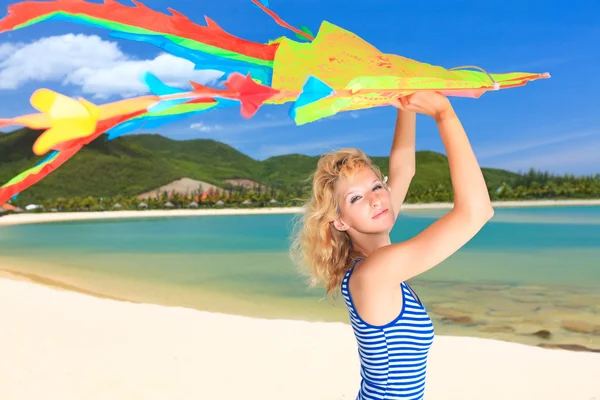 Woman with kite — Stock Photo, Image