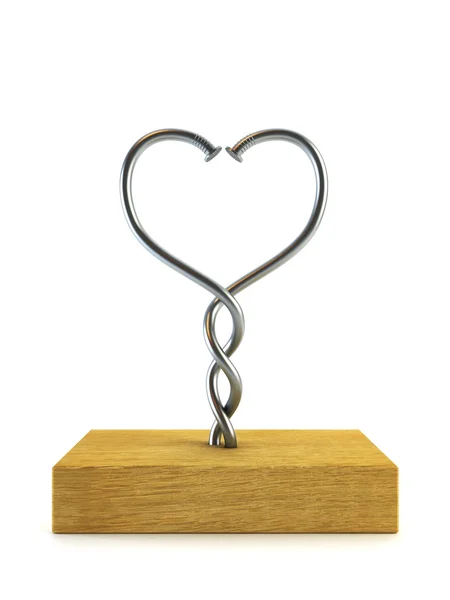 Dva kroucené hřebíky ve tvaru srdce — Stock fotografie
