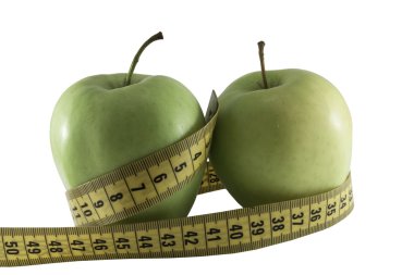 Yeşil elma ve ölçme musluğu