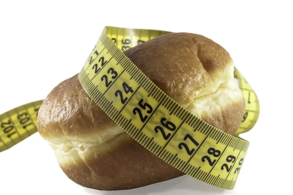 stock image Doughnut and measuring tape