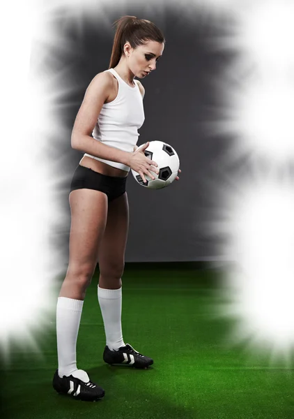 Sexy jogador de futebol no estádio — Fotografia de Stock