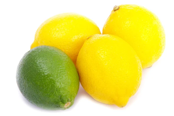A group of one limes and three lemons — Stock Photo, Image