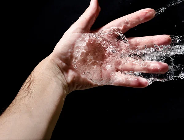 Hand und Spritzwasser — Stockfoto