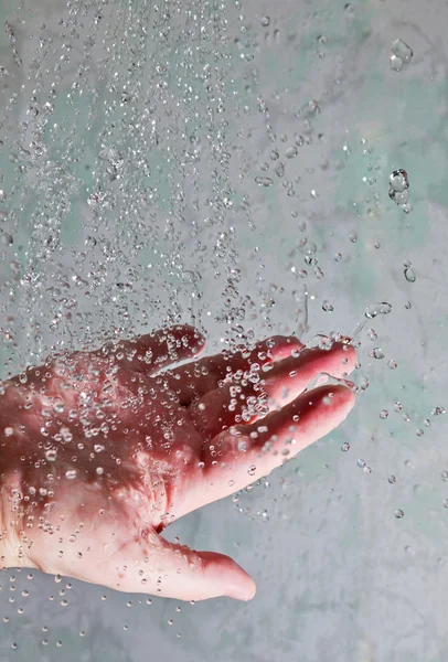 stock image Hand and splashing water