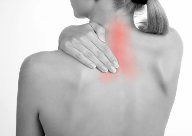 Woman holds a hand on pain neck 2 clipart