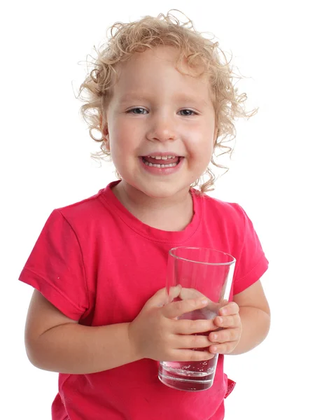 Child with a water glass — Stockfoto