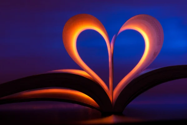Open book in heart shape — Stock Photo, Image