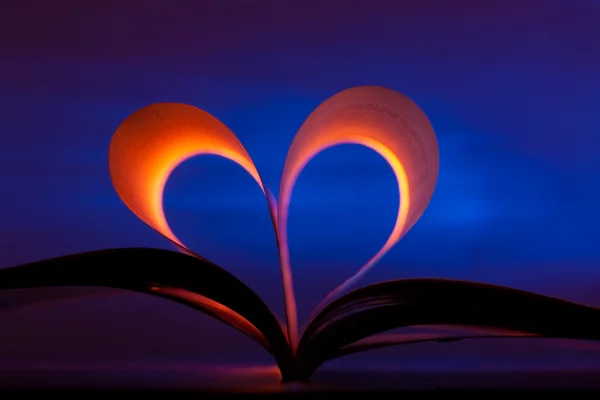 Open book in heart shape — Stock Photo, Image