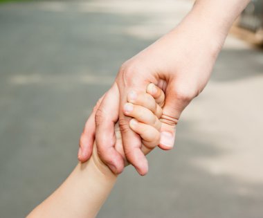 Hands of mothers and daughters clipart