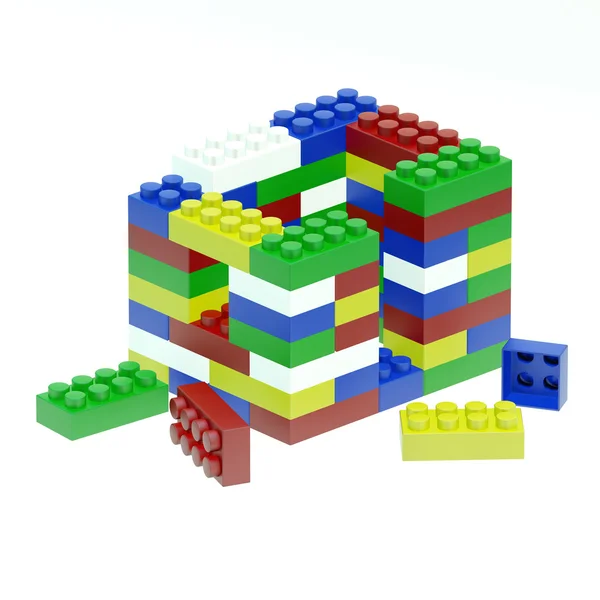 A casa de construção é feita de blocos infantis coloridos diferentes — Fotografia de Stock