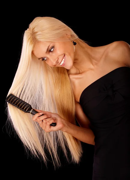 Portret van een jonge vrouw met blond haar — Stockfoto