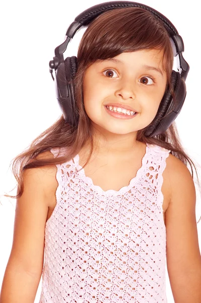 Girl in big ear-phones — Stock Photo, Image