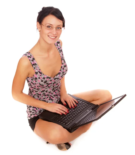 笔记本电脑的黑发女孩 图库图片