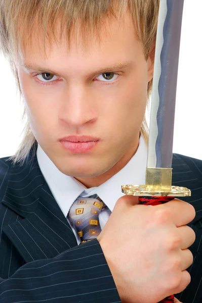 Человек с мечом защищает бизнес — стоковое фото