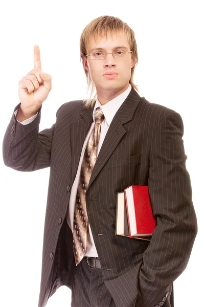 Шкільний вчитель з книгами піднімає палець вгору — стокове фото