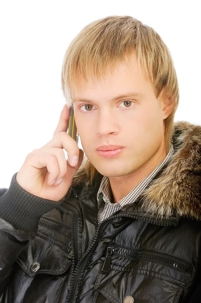 Hombre en chaqueta de invierno habla por teléfono —  Fotos de Stock
