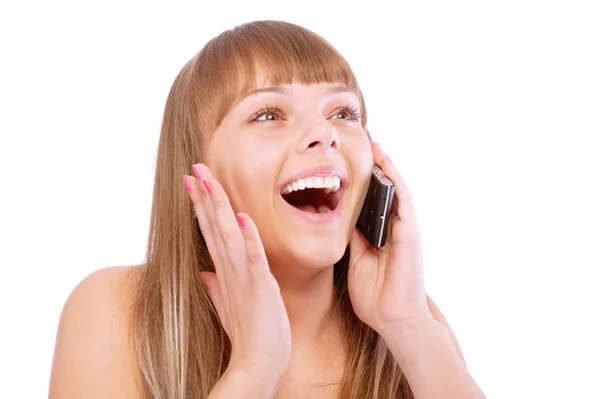 Beautiful girl speaks by phone and laughs — Stock Photo, Image