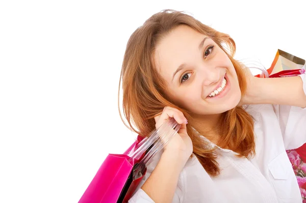 Portrait of an young woman holding several shoppingbag — Stock Photo, Image