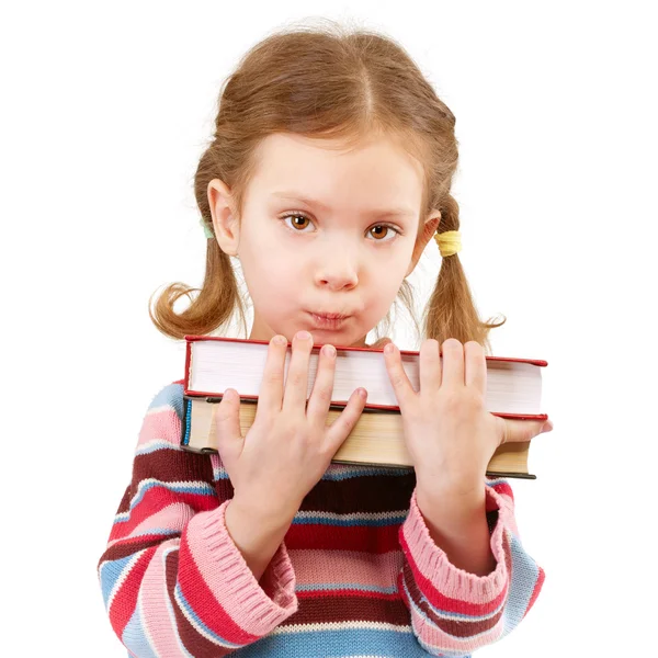Criança pré-escolar ofendida detém livros didáticos — Fotografia de Stock