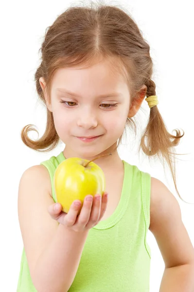 Yeşil elma ile küçük kız — Stok fotoğraf