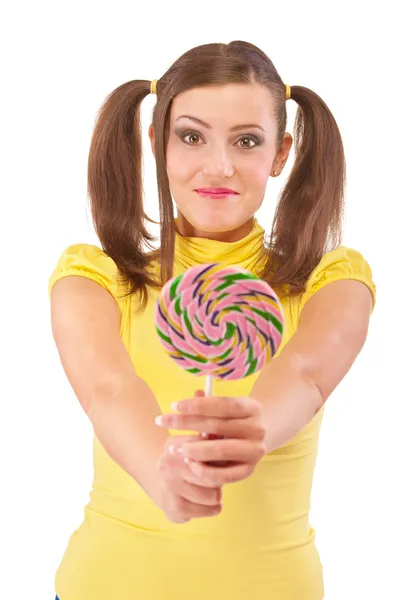 Girl with plaits holds lolipop — Stock Photo, Image