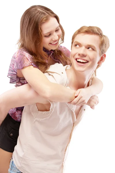 Smějící se dívka rozkročmo mladý muž — Stock fotografie